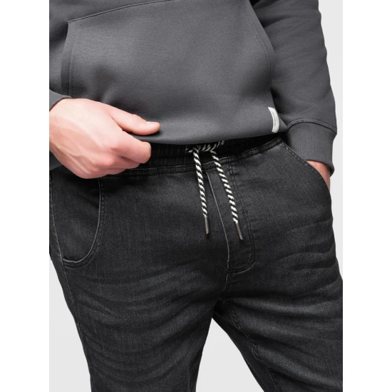 Vyriški juodi džinsai  su raišteliu juosmenyje Patrick Kelnės