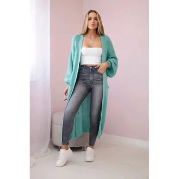 Lemon, a female mint-colored cardigan