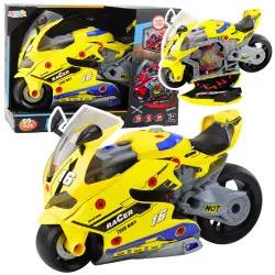 Geltonas motociklas su dirbtuvėmis